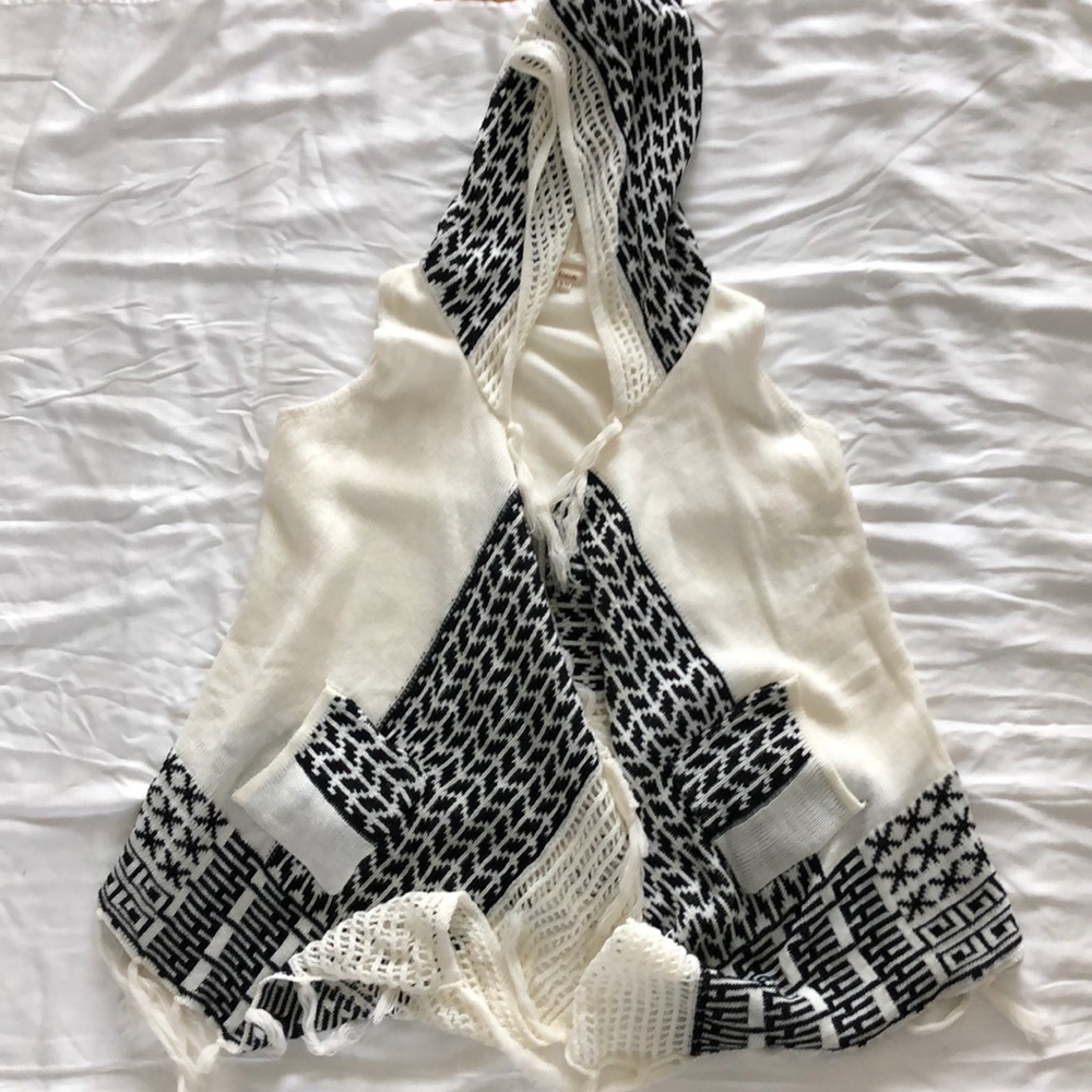 Hooded black and white fringe asymmetrical vest